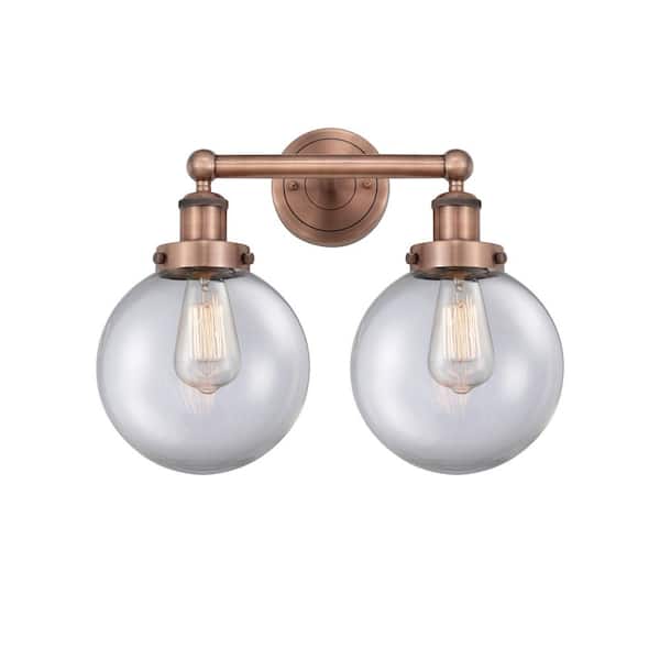 Beacon 15.5 in. 2-Light Antique Copper Vanity Light with Glass Shade