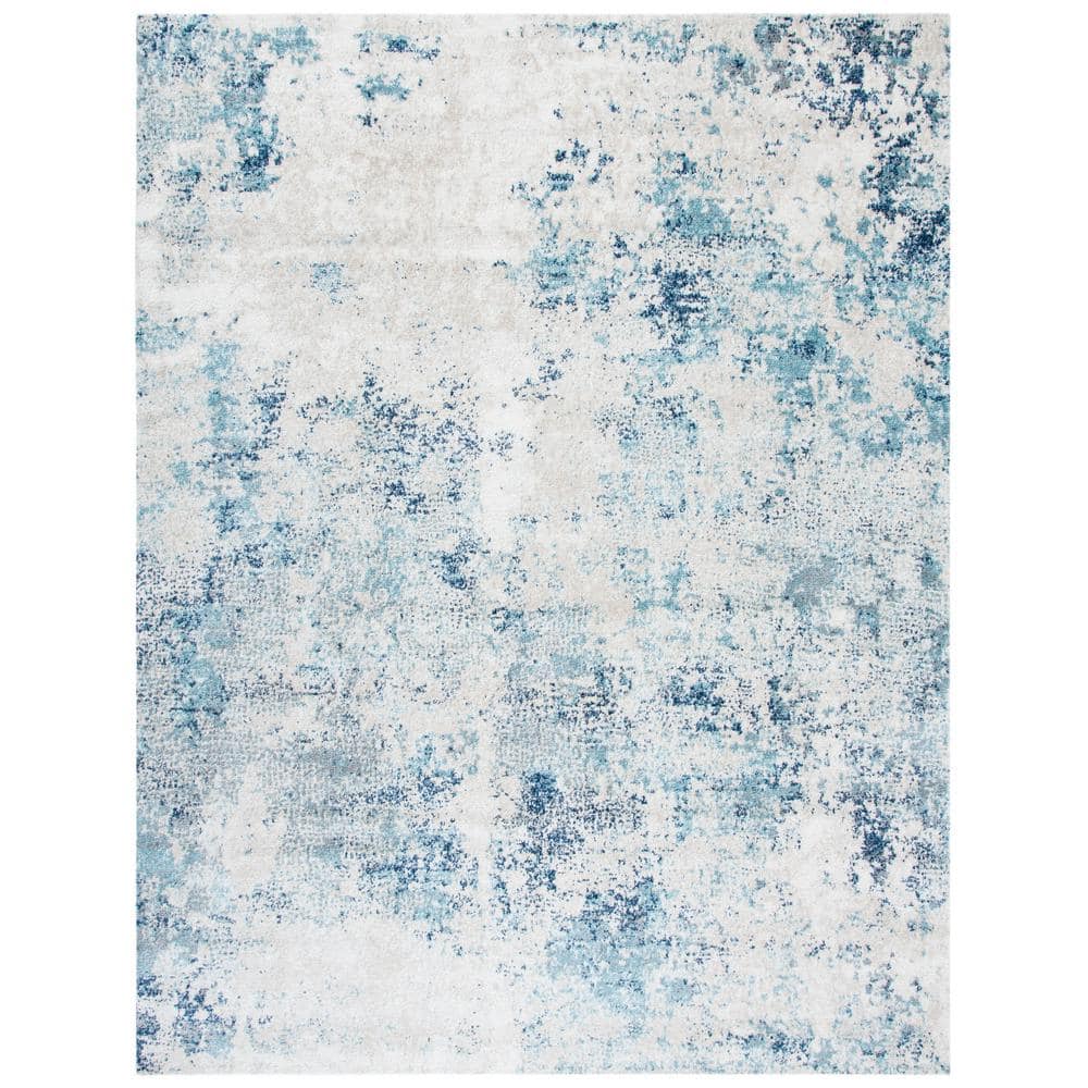 Ivory and Blue Abstract 9' x 12' Stain-Resistant Rug