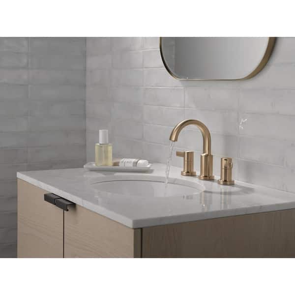 Albion Gold 8 in. Widespread Double Handle Bathroom Faucet with Drain Kit Included in Champagne Bronze
