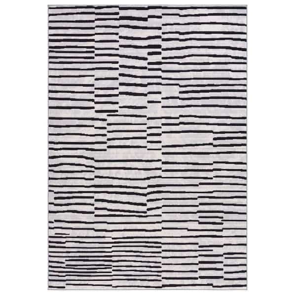Odyssey 5 ft. x 8 ft. Gray/Black Abstract Striped Area Rug