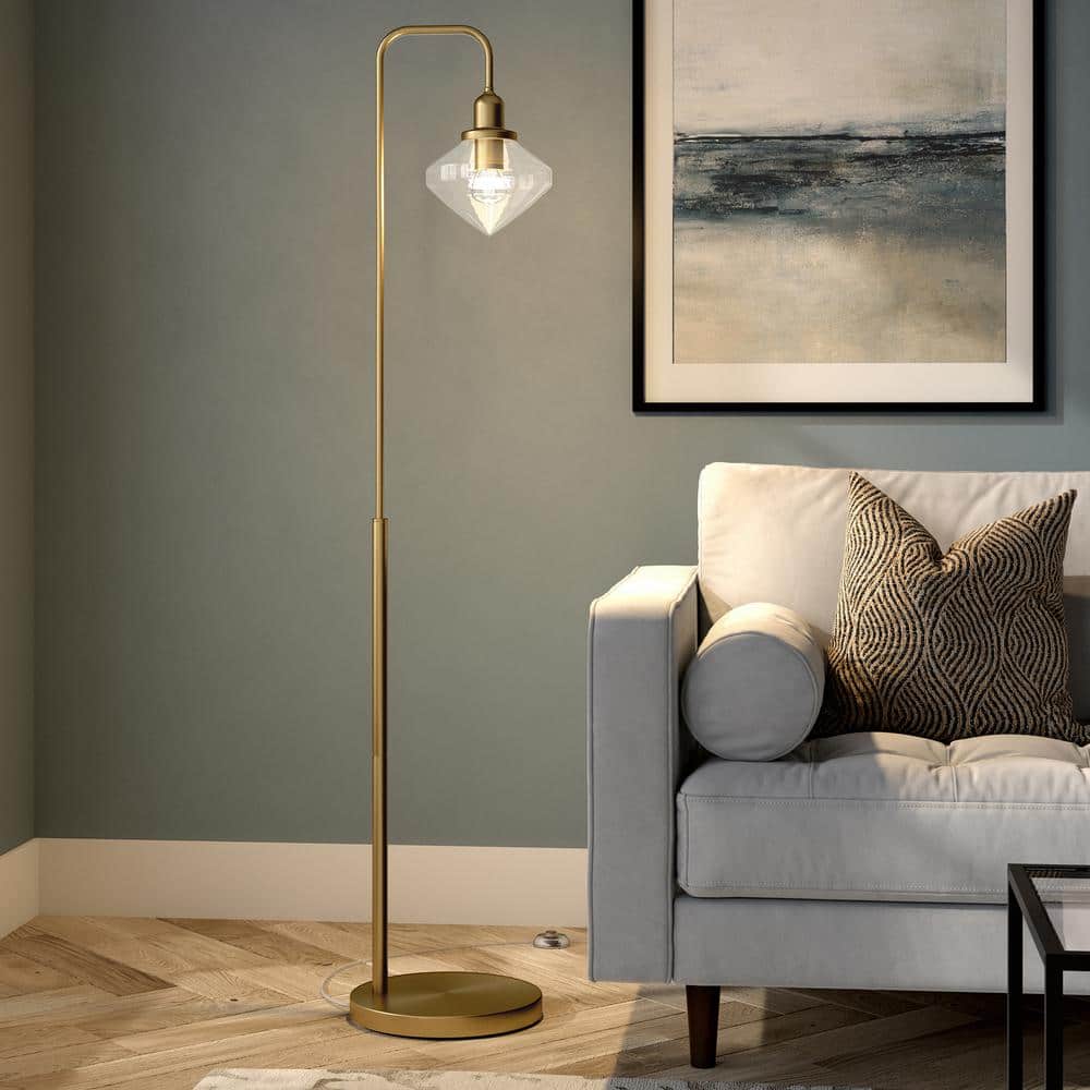 Zariza 62" Adjustable Arc Floor Lamp with Glass Globe Shade in Brass
