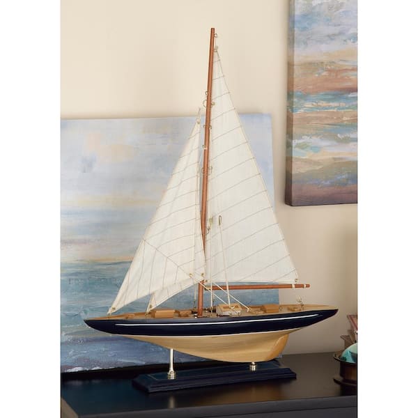 Litton Lane Beige Wood Sail Boat Sculpture with Navy Accents and Lifelike Rigging