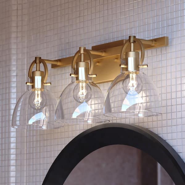 Ogden 25.5 in. W 3-Light Contemporary Classic Gold Bathroom Vanity Light Fixture Clear Glass
