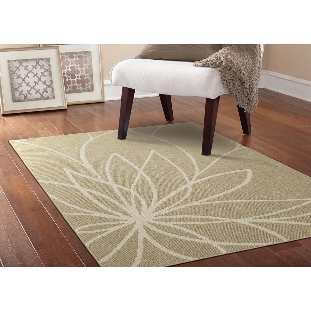 Tan and Ivory Floral Tufted Synthetic 5' x 7' Area Rug