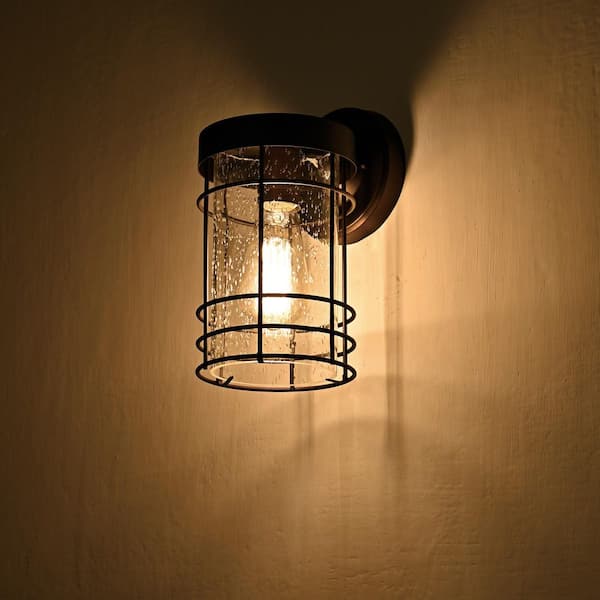 Edvivi Charlton 1-Light Transitional Textured Black Cage Outdoor Wall Lantern Sconce with Seedy Glass