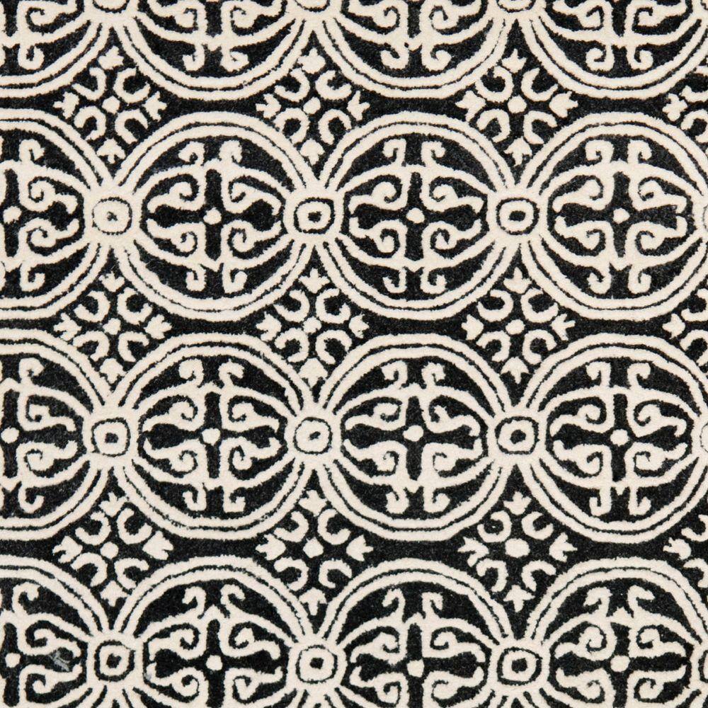 Black and Ivory Hand-Tufted Wool Geometric 9' x 12' Area Rug