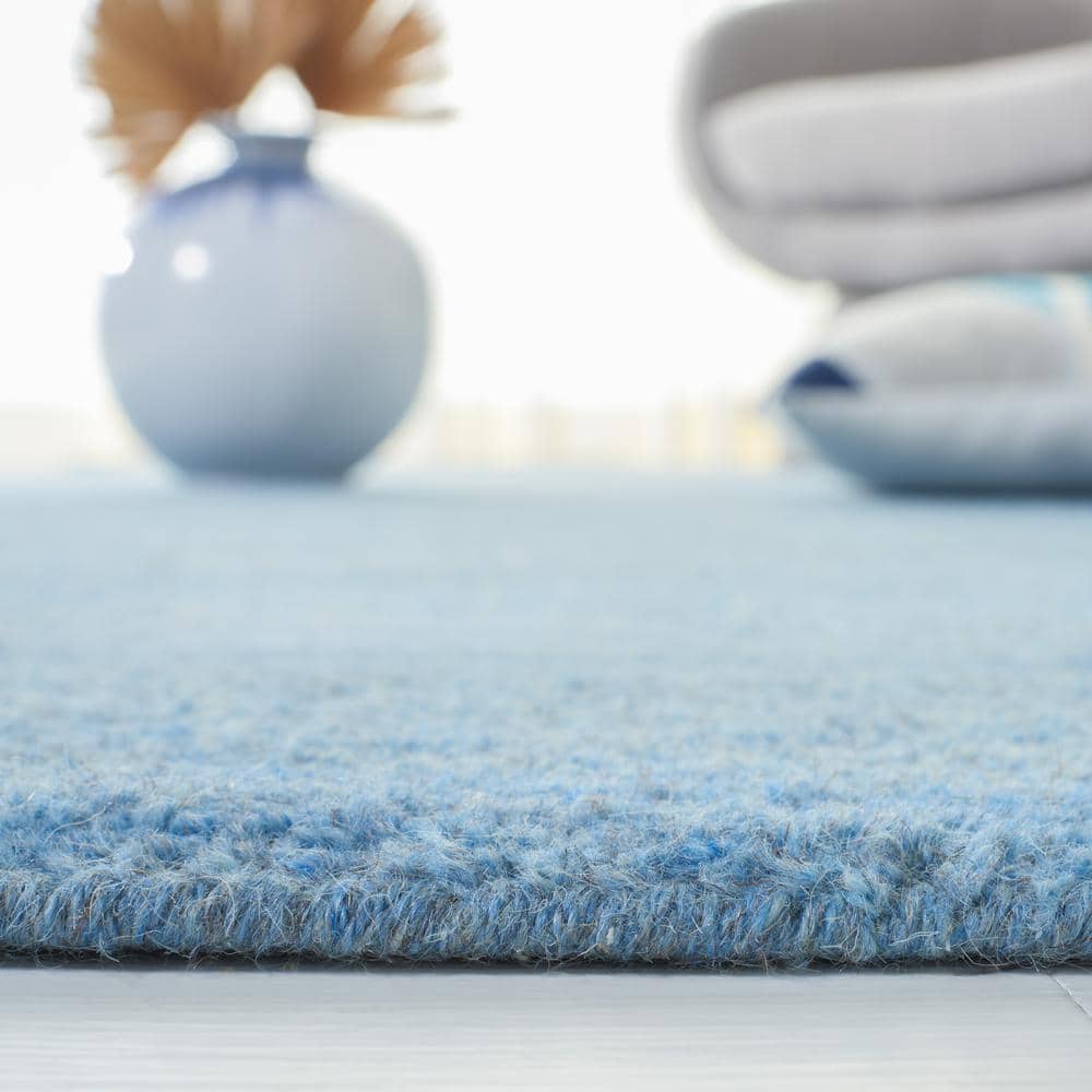 Handmade Coastal Blue Solid Wool Rectangular Accent Rug