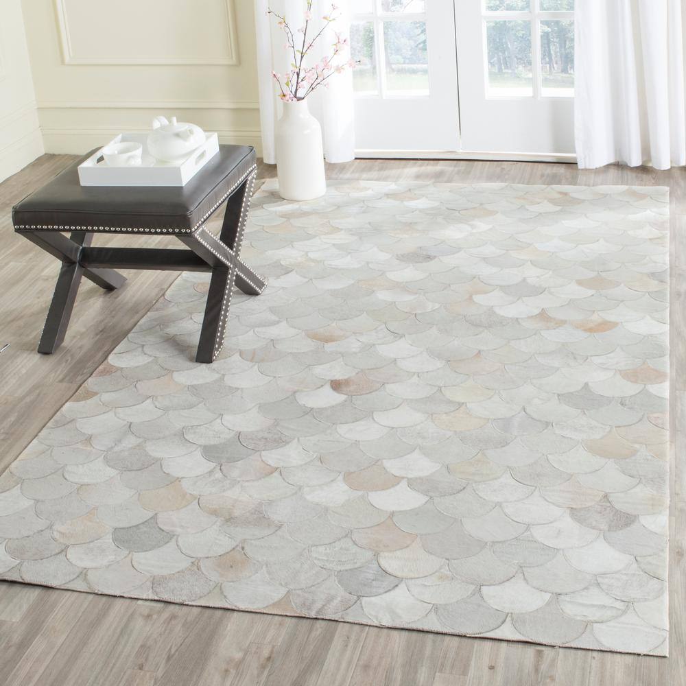 Ivory Geometric Handmade Cowhide Area Rug