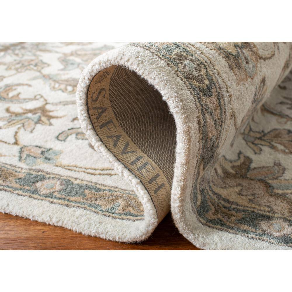 Handmade Ivory Floral Tufted Wool Round Rug, 5' x 5'