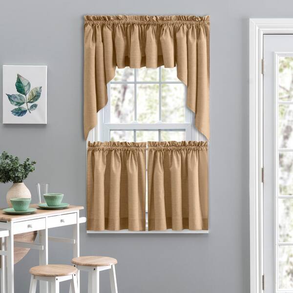 https://images.thdstatic.com/productImages/fed1a8a3-8152-4bb2-8f05-3720dd8deb1e/svn/tan-ellis-curtain-light-filtering-curtains-717547034565-31_600.jpg