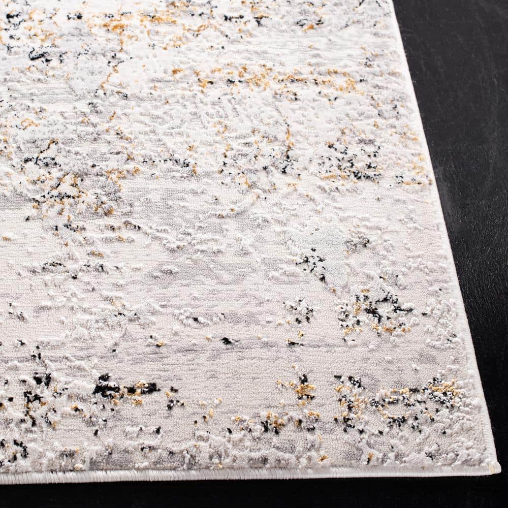 Cream and Gold Abstract 4' x 6' Stain-Resistant Area Rug