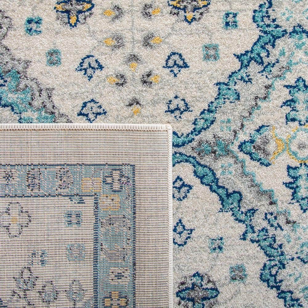 Ivory and Light Blue Floral Synthetic 9' x 12' Rectangular Area Rug