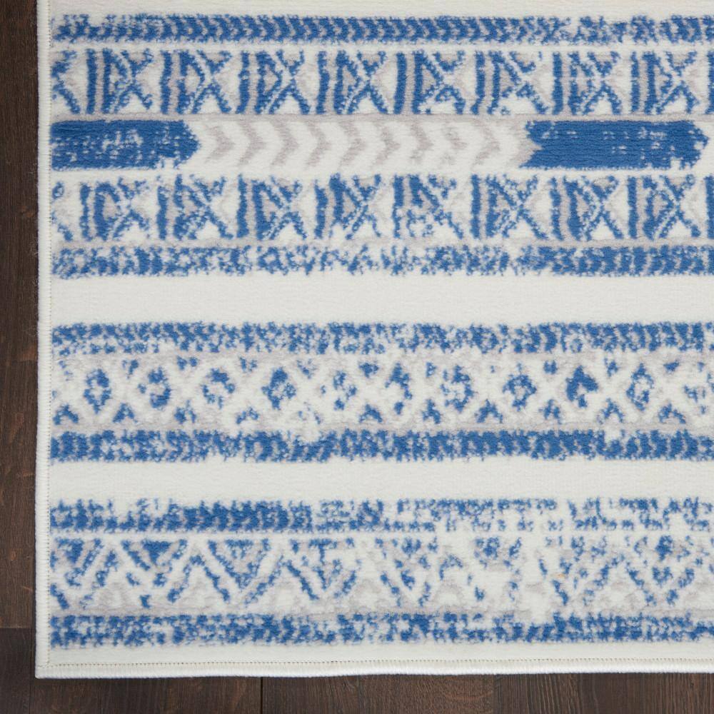 Ivory Blue Geometric Synthetic 6' x 9' Easy-Care Area Rug