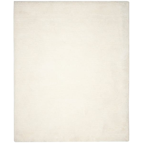 Ultimate Shag 9 ft. x 12 ft. Ivory Distressed Solid Color Area Rug