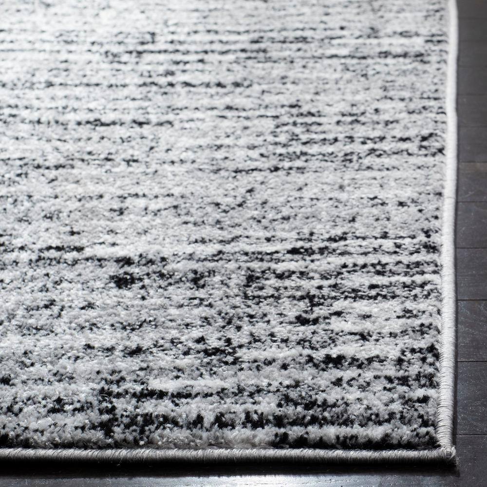 Reversible Black Stripe Synthetic 8' x 10' Rectangular Rug