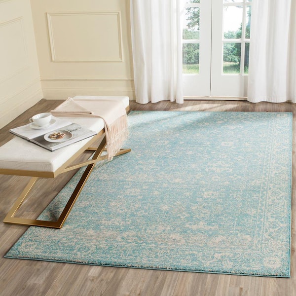 Evoke Light Blue/Ivory 7 ft. x 9 ft. Border Area Rug