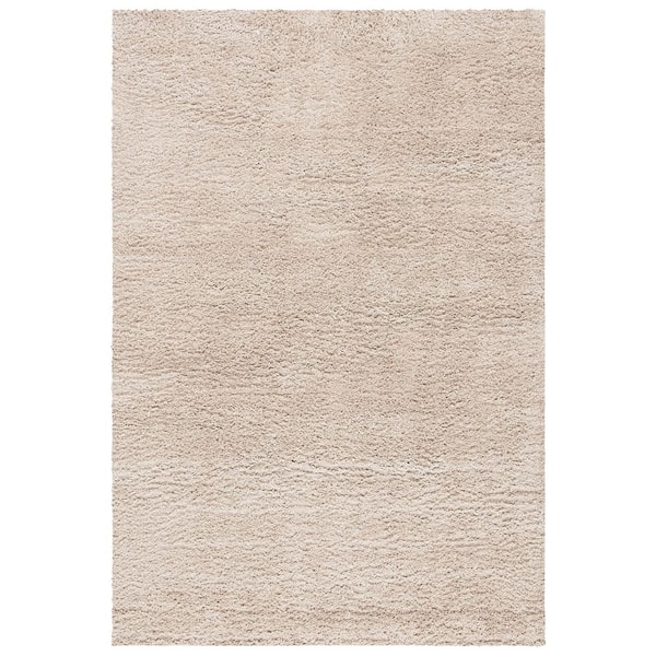 August Shag 9 ft. x 12 ft. Beige Solid Color Area Rug