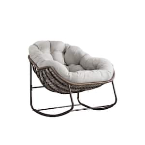 Brown Wicker Outdoor Rocking Chair with Beige Cushion