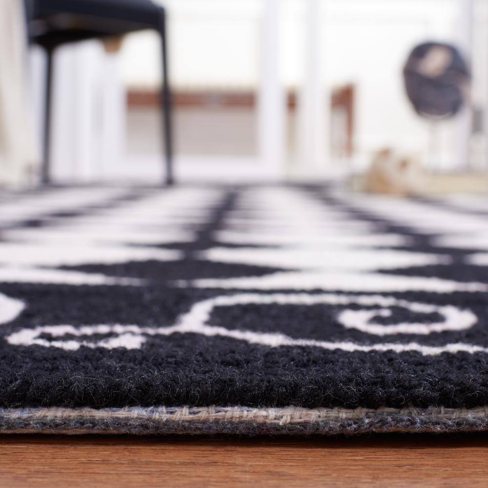 Handmade Black and Ivory Wool Floral Small Rug