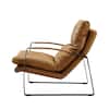 Side view of a light brown genuine leather accent lounge chair with a black metal frame.