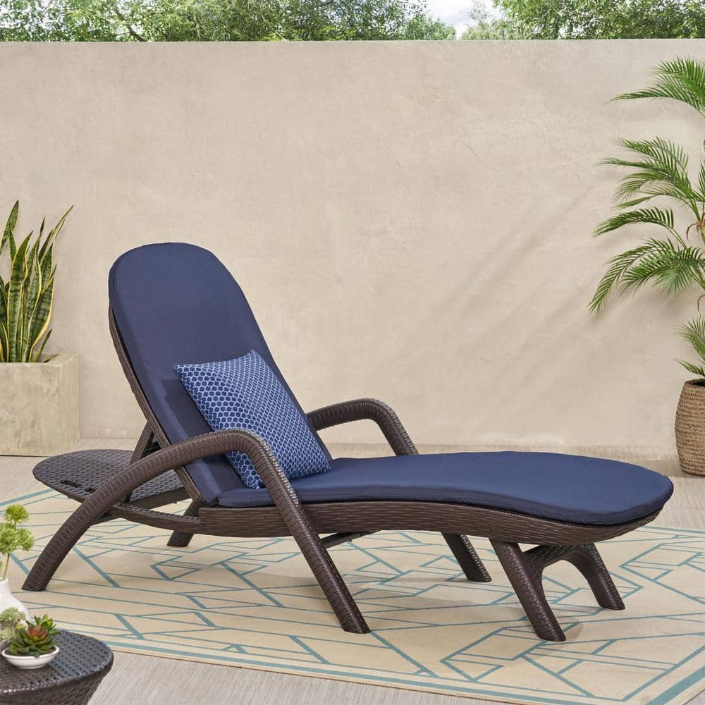 Mikael Dark Brown 1-Piece Faux Wicker Outdoor Patio Chaise Lounge with Navy Blue Cushion -  Noble House, 83837