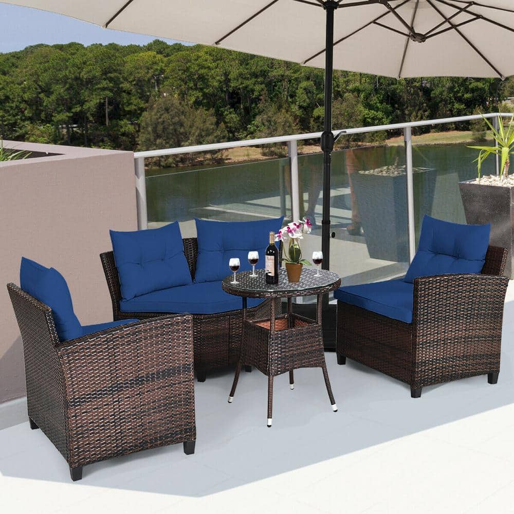4-Piece Wicker Patio Conversation Set with Navy Cushions and Glass Tabletop