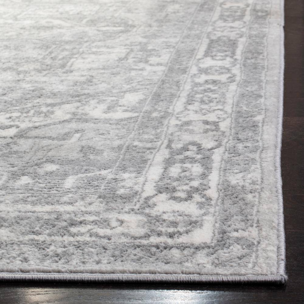 Brentwood Cream and Grey Synthetic Rectangular Area Rug