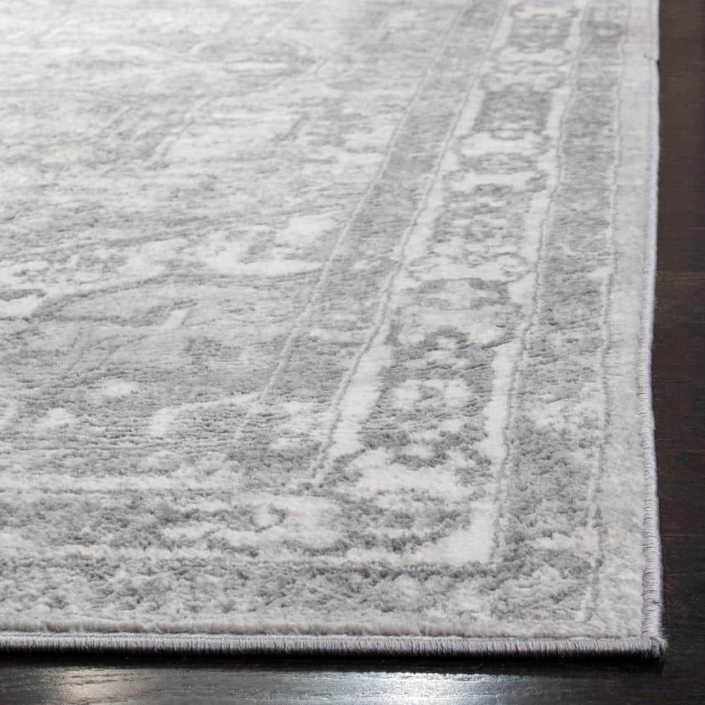 Cream and Grey Rectangular 4' x 6' Stain-Resistant Synthetic Area Rug