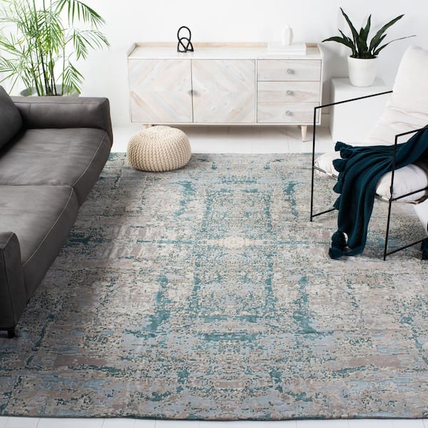 Centennial 9 ft. x 12 ft. Worn Denim Distressed High-Low Area Rug