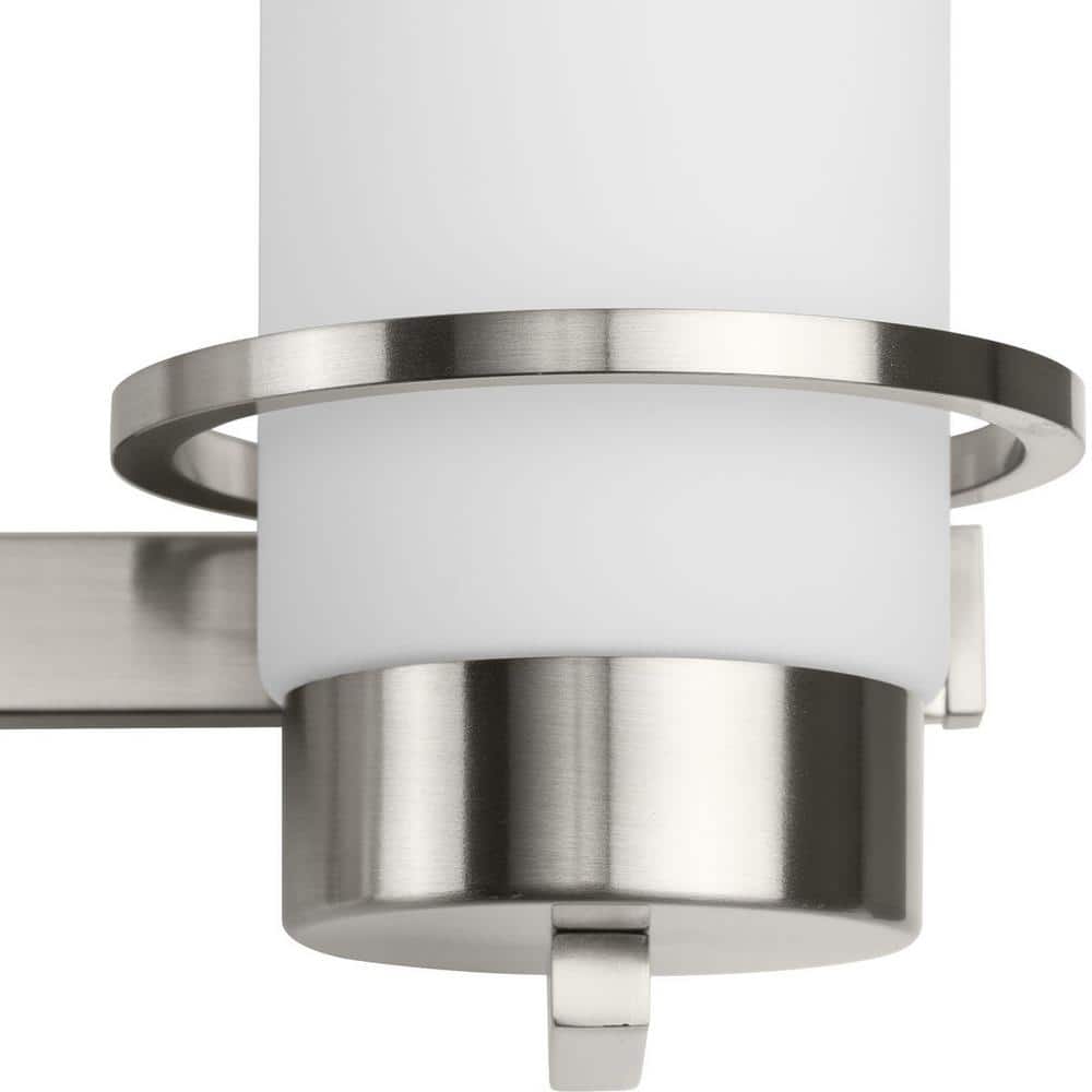 Reiss Brushed Nickel 4-Light Vanity with White Glass Shades