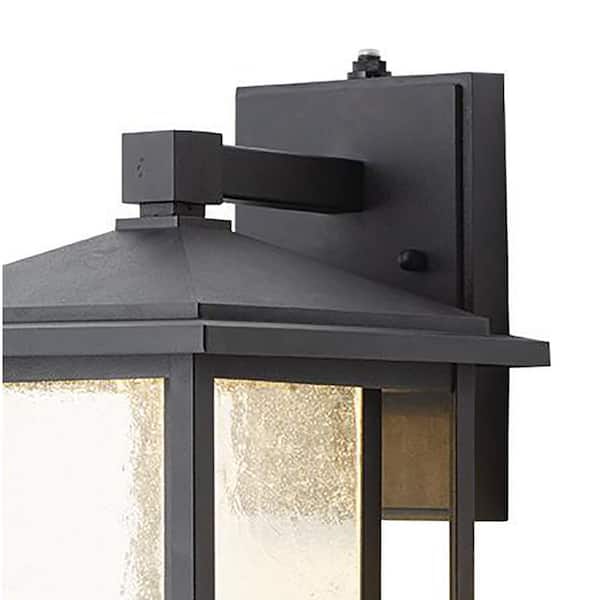 Home Decorators Collection - Mauvo Canyon 15.5 in. Black Dusk to Dawn LED Outdoor Wall Light Fixture Porch Sconce with Seeded Glass