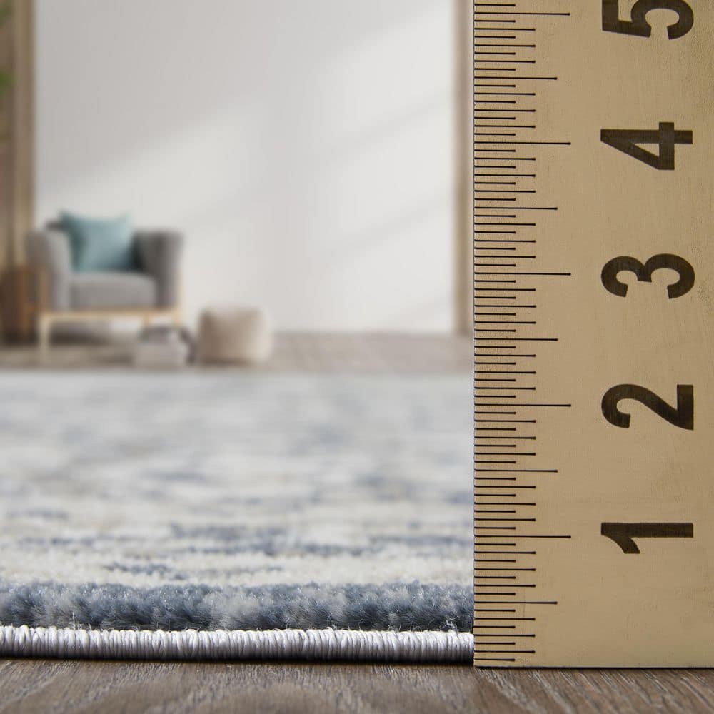 Rectangular 9' x 12' Blue Floral Synthetic Area Rug