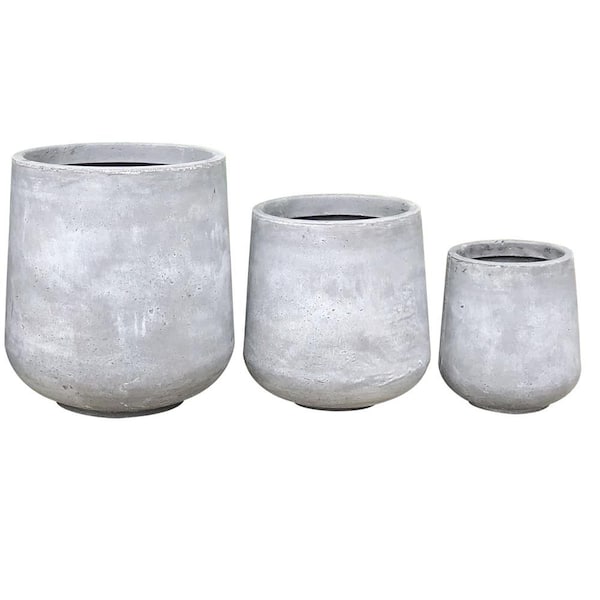 Photo 1 of 17.3 in. Tall Natural Lightweight Concrete Footed Tulip Outdoor Round Planter (Set of 3)