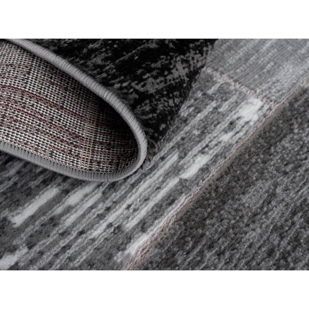 Black and Gray Geometric Synthetic 5' x 7' Area Rug