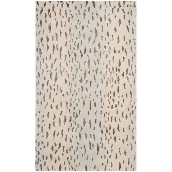 Tibetan 4 ft. x 6 ft. Silver Leopard Print Area Rug