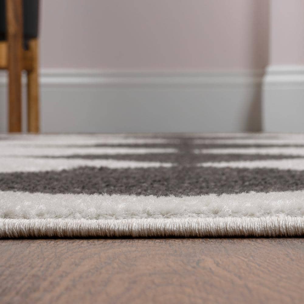 White and Dark Gray Geometric Synthetic Runner Rug, 2 x 8 ft.