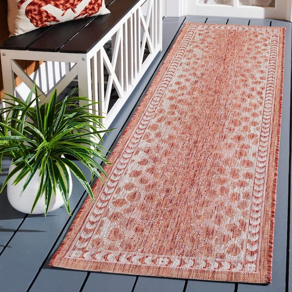 Courtyard Rust/Beige 2 ft. x 8 ft. Arrow Border Cheetah Indoor/Outdoor Runner Rug