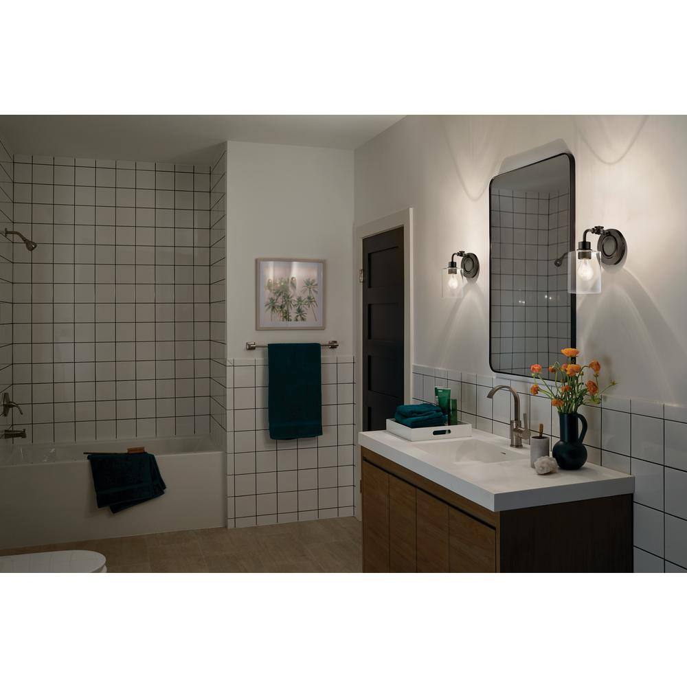 Black Steel Cylinder Wall Sconce with Clear Seeded Glass Shade